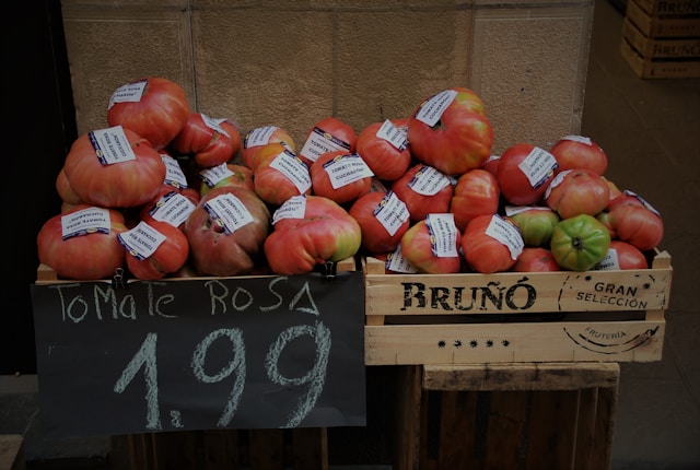 tomatoes with a price sign